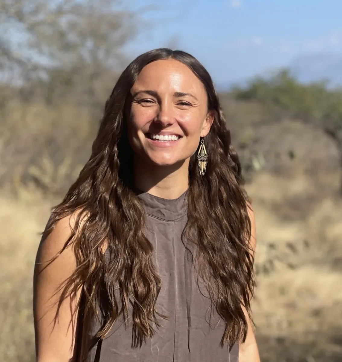 Portrait of Briana Evigan smiling outdoors