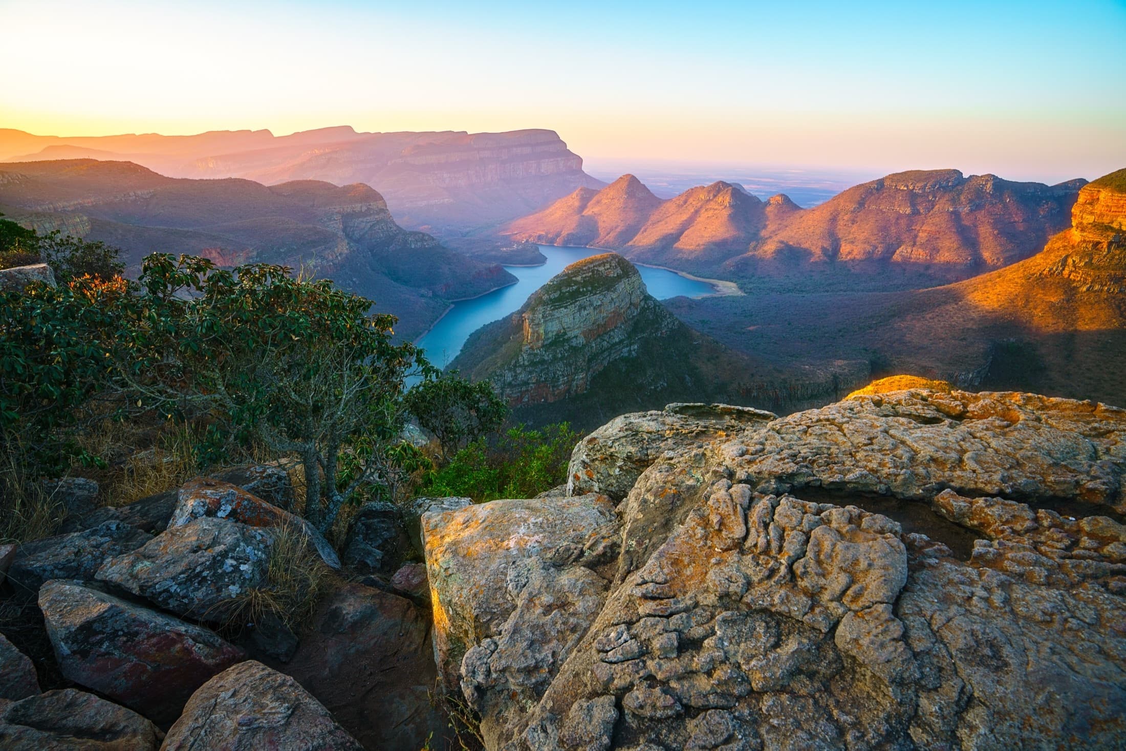 View of the Three Rondavels and Blyde River Canyon at sunset