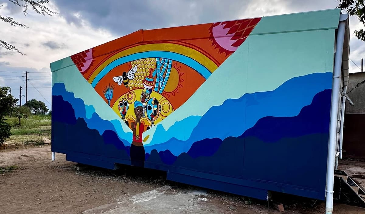 A painted mural covering a school wall