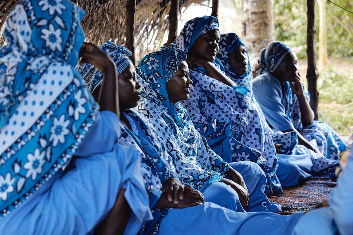 Members of the Mwani Zanzibar and Abundant Village teams together on the coast